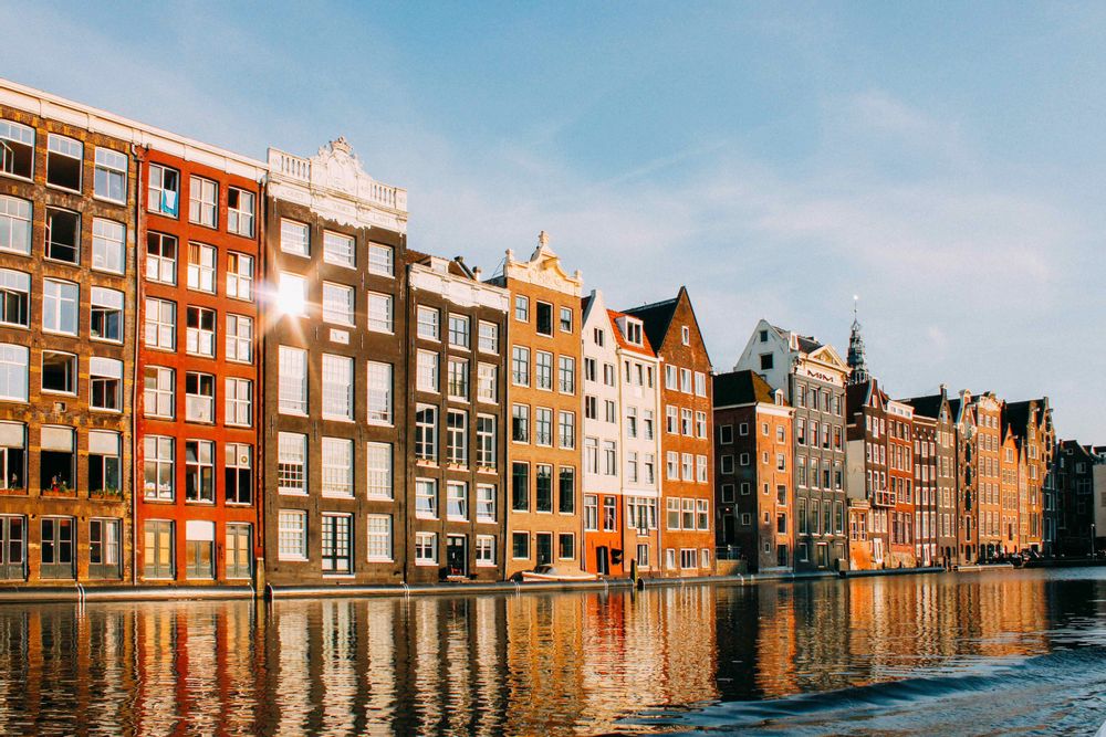 Sunny views reflecting off the Dutch buildings on the canals. 
